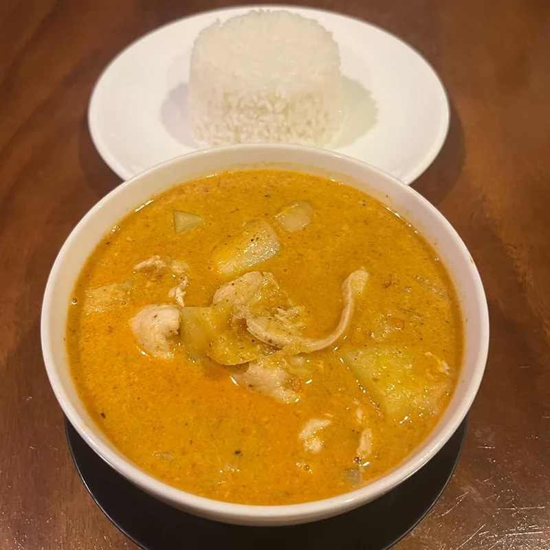 thai massaman curry with coconut milk peanuts and warm spices