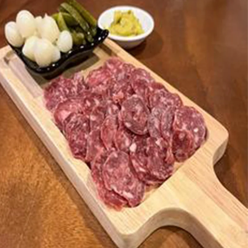 artisan salami served with gherkins, pickled garlic and homemade mustard